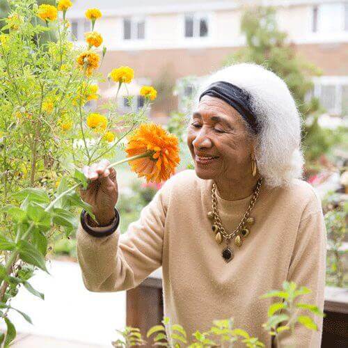 Smelling the flowers at Carlton Senior Living